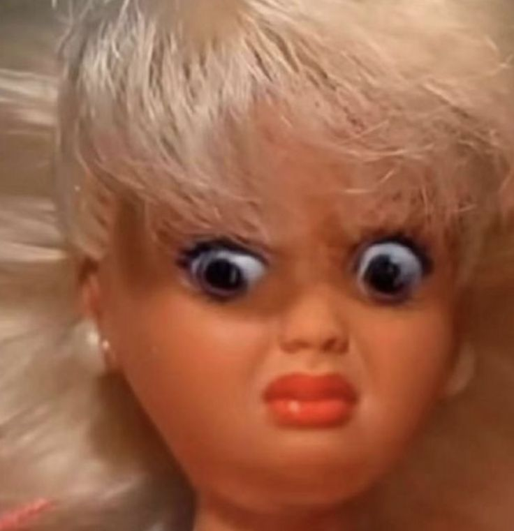 Angry doll face magnet