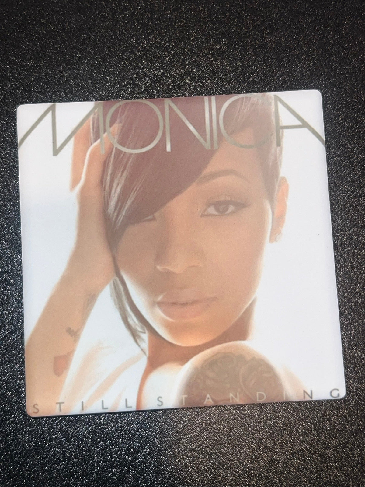 Monica Still Standing vinyl cover ceramic coaster