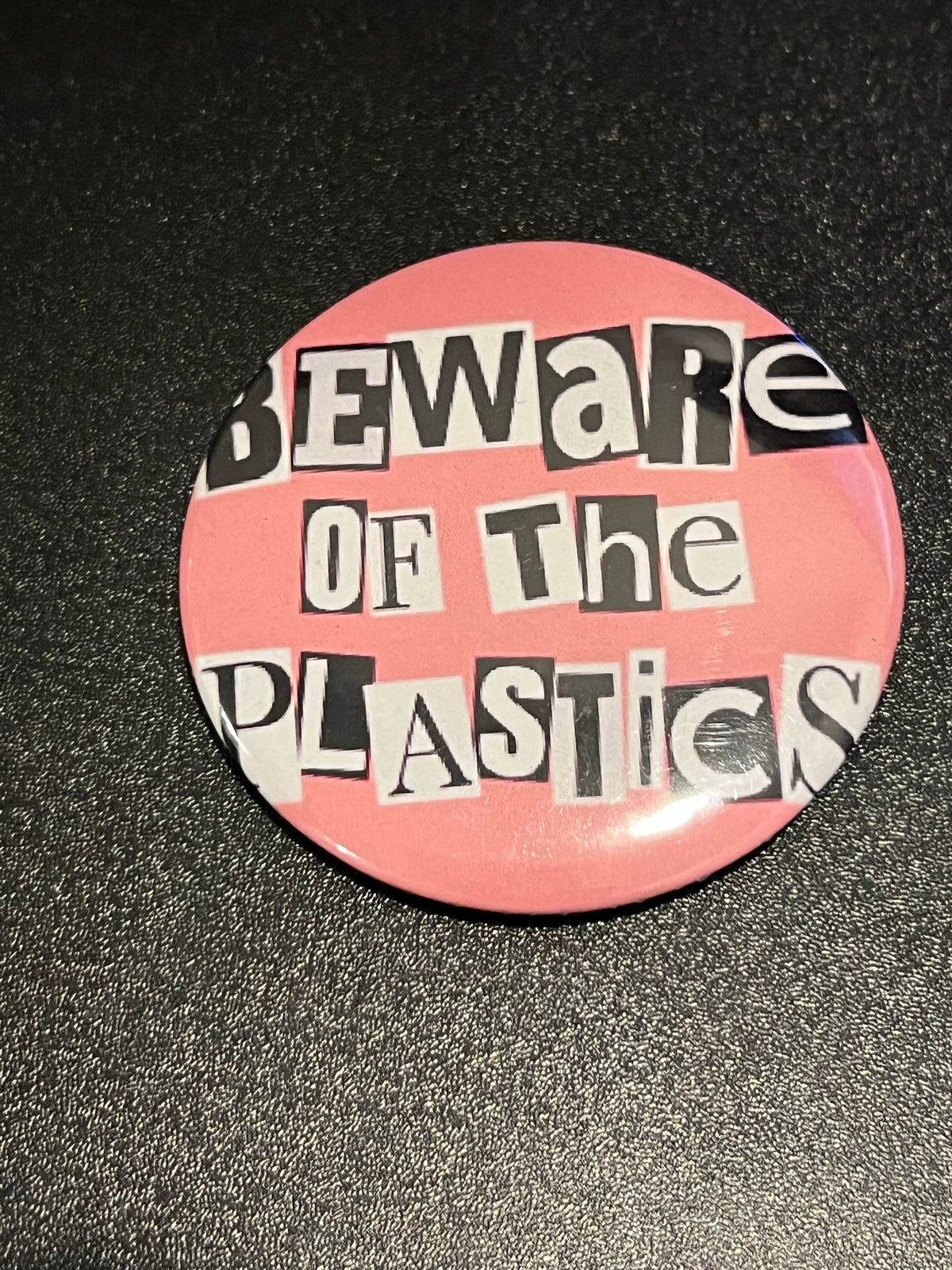 Beware of the Plastics Button
