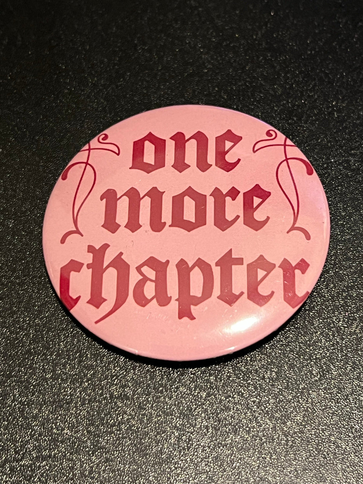 One More Chapter Button