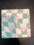 Retro checkered daisy coaster