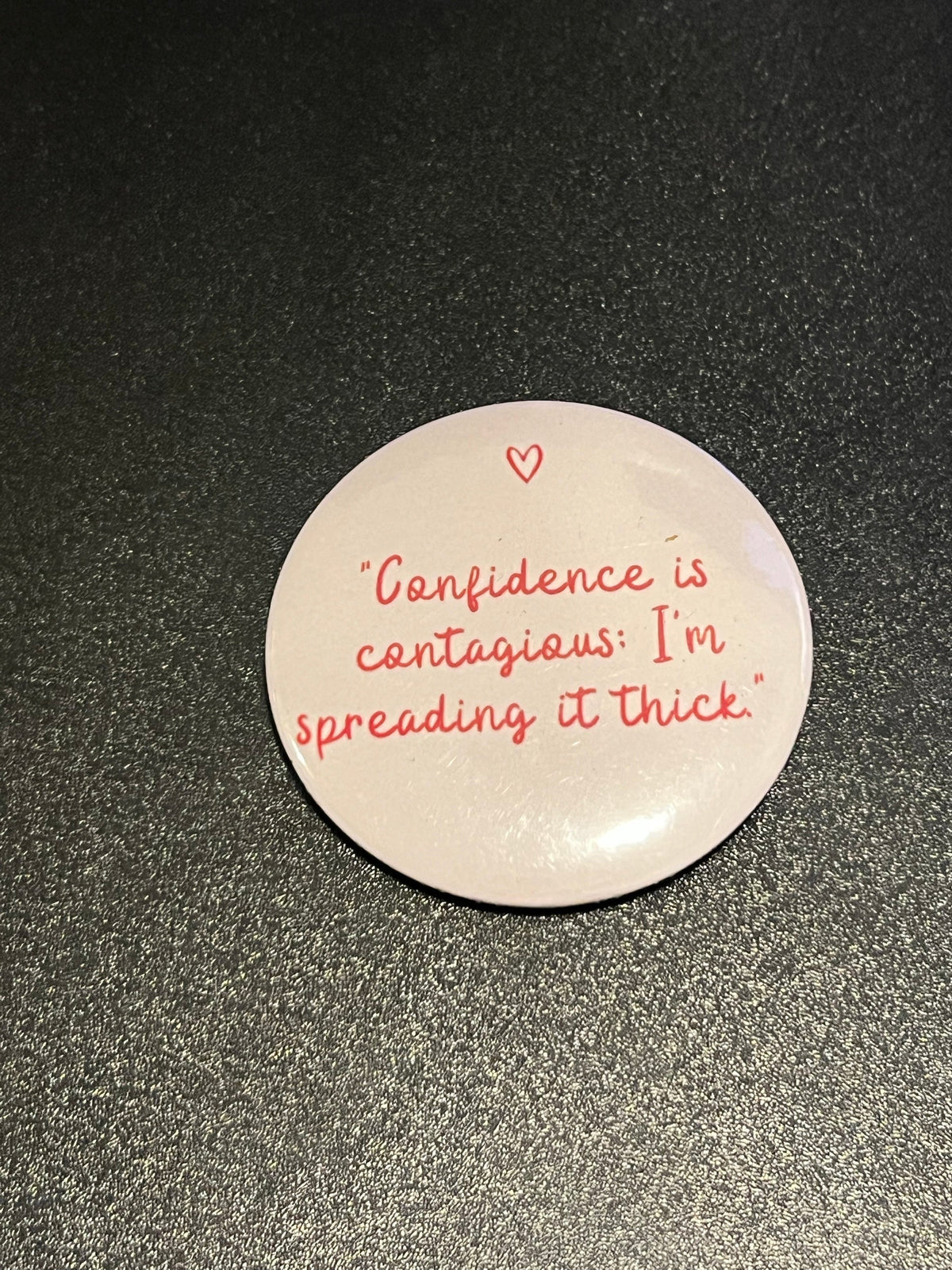 Confidence Is Contagious Button